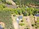 Expansive aerial view showcasing the home and property, including the nearby lake at 637 Lakeview Dr, Newborn, GA 30056