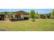 Expansive backyard featuring a chicken coop and shed, perfect for hobby farming and outdoor activities at 637 Lakeview Dr, Newborn, GA 30056
