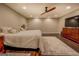 Bedroom features wood floors and a comfortable bed at 637 Lakeview Dr, Newborn, GA 30056