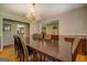 Formal dining room features hardwood floors and an elegant chandelier at 637 Lakeview Dr, Newborn, GA 30056