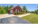 Charming brick home featuring an attached garage and beautifully landscaped front yard at 637 Lakeview Dr, Newborn, GA 30056