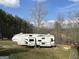 Modern RV with clean lines and a sleek design, perfect for comfortable travel and outdoor adventures, great for camping at 637 Lakeview Dr, Newborn, GA 30056