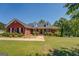 Charming single-story brick home with a well-manicured lawn and inviting covered front porch at 637 Lakeview Dr, Newborn, GA 30056
