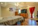 Spacious bedroom offers a ceiling fan and direct access to the outdoors at 637 Lakeview Dr, Newborn, GA 30056