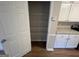 Pantry with wire shelving and white cabinets and countertops, perfect for organized storage at 120 Lazy Hollow Ln, Covington, GA 30016