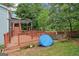 Elevated wooden deck overlooking an abundant and well-maintained green backyard at 1152 Sunday Ln, Jonesboro, GA 30238