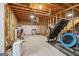 Spacious unfinished basement with utilities and various household items stored at 1152 Sunday Ln, Jonesboro, GA 30238