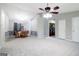 View of the dining area with chandelier, table with seating, and access to the laundry room at 1152 Sunday Ln, Jonesboro, GA 30238