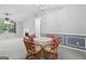 Open dining area view with seating, view of fireplace and entry doors at 1152 Sunday Ln, Jonesboro, GA 30238