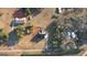 Sprawling acreage featuring a home, barn, outbuildings, and wooded boundaries, offering ample space and rural charm at 4180 Mount Paran Dr, Social Circle, GA 30025