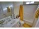 Bathroom featuring a vanity, mirror, toilet and bathtub with shower at 4180 Mount Paran Dr, Social Circle, GA 30025