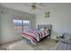 Bedroom featuring natural light and a bed with gray headboard at 4180 Mount Paran Dr, Social Circle, GA 30025