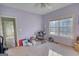 Bedroom with window and doorway to a neighboring room at 4180 Mount Paran Dr, Social Circle, GA 30025