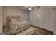 Cozy bedroom featuring a ceiling fan, carpeted floors, and closet with panel doors at 4180 Mount Paran Dr, Social Circle, GA 30025