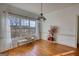 Bright dining area featuring hardwood flooring, natural light, and cozy seating at 4180 Mount Paran Dr, Social Circle, GA 30025