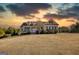 Inviting single-Gathering home with manicured lawn, lovely front porch, and warm curb appeal at 4180 Mount Paran Dr, Social Circle, GA 30025