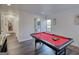 Game room with a pool table, with a bathroom nearby, offers space and entertainment at 4180 Mount Paran Dr, Social Circle, GA 30025
