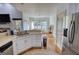 Open-concept kitchen with breakfast nook provides an eat-in dining experience at 4180 Mount Paran Dr, Social Circle, GA 30025