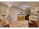 Charming kitchen with wood cabinets, decorative lighting, and modern appliances, creating a functional and stylish space at 4180 Mount Paran Dr, Social Circle, GA 30025