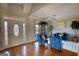 Welcoming living room features hardwood floors, and bright natural light at 4180 Mount Paran Dr, Social Circle, GA 30025