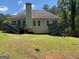 Spacious backyard with two decks and stairs leading to the yard at 2828 Hicks Sw Rd, Marietta, GA 30060