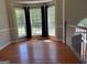 Bright and airy living room boasting hardwood floors, large bay window, and neutral paint at 2828 Hicks Sw Rd, Marietta, GA 30060