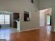 Open-concept living area with hardwood flooring, a view to the kitchen, and chandelier lighting at 2828 Hicks Sw Rd, Marietta, GA 30060