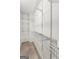 Walk-in closet with wire shelving system and tile floors at 106 June Ct, Hampton, GA 30228