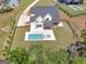 A new home with a pool and spa, a patio for entertaining, and a meticulously manicured yard at 260 Cicely Way, Tyrone, GA 30290