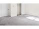 Spacious bedroom with double doors to closet and soft carpeting at 6533 Waterford Sw St, Atlanta, GA 30331