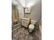 Bathroom featuring tile flooring, a toilet, vanity with mirror and a shower at 578 Lakeridge Se Cir, Conyers, GA 30094