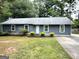 Charming single story home with well-maintained lawn and traditional design at 578 Lakeridge Se Cir, Conyers, GA 30094