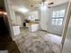 Bright kitchen features a combination of white cabinets and modern countertops at 578 Lakeridge Se Cir, Conyers, GA 30094