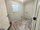 Room with tile flooring and laundry hookups at 578 Lakeridge Se Cir, Conyers, GA 30094