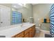 Bathroom featuring a long vanity, shower with striped curtain, and tile flooring at 510 Jenna Trl, Mcdonough, GA 30252