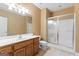 Bathroom features a single sink vanity, walk-in shower, and a neutral color scheme at 510 Jenna Trl, Mcdonough, GA 30252