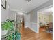 Lovely foyer featuring hardwood floors, leading to multiple living spaces with neutral wall colors and white trim at 510 Jenna Trl, Mcdonough, GA 30252