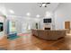 Inviting living room boasts hardwood flooring, fireplace, comfortable seating, and natural light at 510 Jenna Trl, Mcdonough, GA 30252