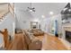 Spacious living room features vaulted ceiling, fireplace, hardwood flooring, and ample natural light at 510 Jenna Trl, Mcdonough, GA 30252