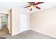 Cozy bedroom features ceiling fan, carpet, and a closet at 2340 Landrum Ct, Lawrenceville, GA 30043