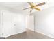 Neutral bedroom features a ceiling fan, and closets at 2340 Landrum Ct, Lawrenceville, GA 30043