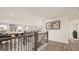 Second floor hallway featuring wood floors and views of the secondary living area at 1739 Goodwin, Hampton, GA 30228