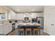 Modern kitchen featuring stainless steel appliances, a center island with seating, and ample cabinet space at 1739 Goodwin, Hampton, GA 30228