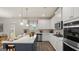 Bright, open kitchen with white cabinets and a large island at 1739 Goodwin, Hampton, GA 30228