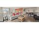 Cozy living room with wood-look flooring and a seating area with Atlanta Falcons pillows at 1739 Goodwin, Hampton, GA 30228