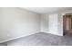 Bedroom showcasing plush carpeting, neutral walls, and doorway to another room at 2805 Topaz Rd, Riverdale, GA 30296