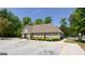 Community center with parking and an outdoor area with a pool and fence at 2805 Topaz Rd, Riverdale, GA 30296