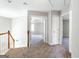 Upstairs hallway with carpeted floor at 2805 Topaz Rd, Riverdale, GA 30296