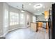 Eat-in kitchen featuring an island and stainless steel appliances, filled with natural light at 2805 Topaz Rd, Riverdale, GA 30296