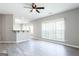Bright living area with bar seating and natural light from the large window at 2805 Topaz Rd, Riverdale, GA 30296